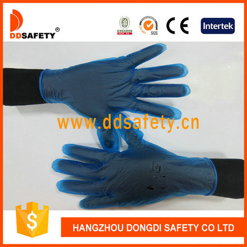 Blue vinyl gloves